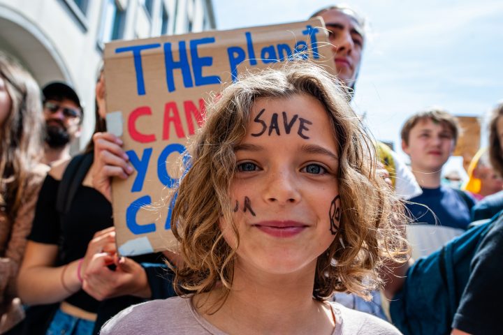 A young girl is saying with her face 'Save our planet', during the protest. Tens of thousands of kids in more than 60 countries went on strike to demand climate change action. #FridaysForFuture is a movement that began in August 2018, after 15-year-old Greta Thunberg sat in front of the Swedish parliament every school day for three weeks, to protest against the lack of action on the climate crisis. In Brussels, not just students, but teachers, scientists, and several syndicates took the streets of the Belgian capital for the second time, to protest for better climate policy. According to the Belgian police around 7500 people took the streets of Brussels, in the last climate demonstration before the EU elections.